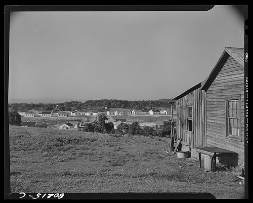 FSA (Farm Security Administration) defense housing project seen from the acreage of an old homestead which will be included in the expanding home village of the Hercules Powder Company workers. Radford, Virginia