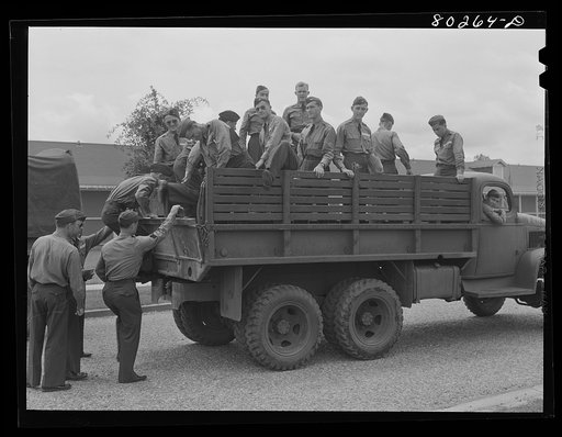Cadets ready to leave for the flying field after a satisfying meal of chicken. Craig Field, Southeastern Air Training Center. Selma, Alabama