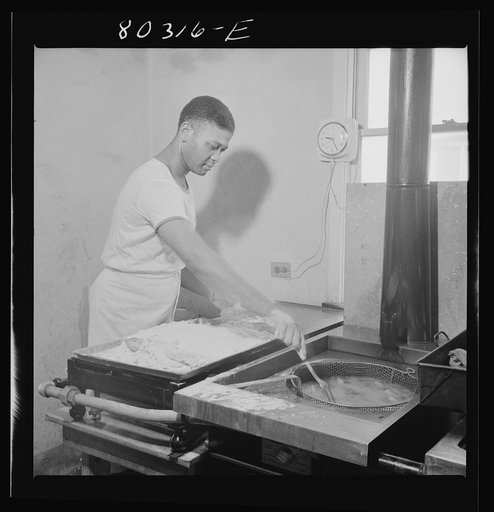 Craig Field cook preparing a feast of FSA (Farm Security Administration) "Food for Defense" chickens. Craig Field, Southeastern Air Training Center, Selma, Alabama