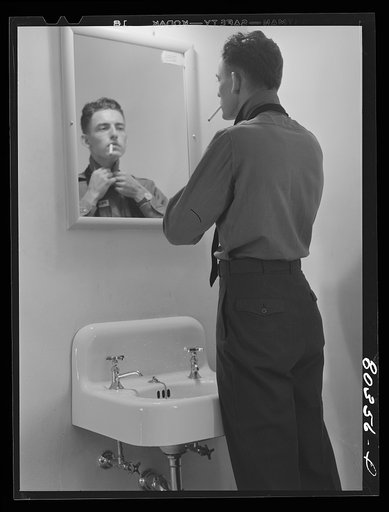 Craig Field, Southeastern Training Center.Cadet dressing for Sunday dinner. Selma, Alabama