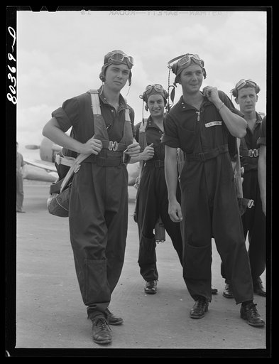 Untitled photo, possibly related to: Cadets ready to mount into their planes after a hearty dinner of fried chicken. Craig Field, Southeastern Air Training Center, Selma, Alabama