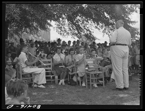 The high school band had been practicing up for weeks. Home guard passes through Enterprise, Coffee County, Alabama