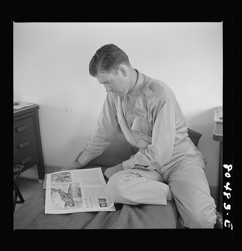 Untitled photo, possibly related to: Flight instructior McTaggart takes things easy after satisfying meal of fried chicken raised by FSA (Farm Security Administration) borrowers. Craig Field, Southeastern Air Training Center. Selma, Alabama