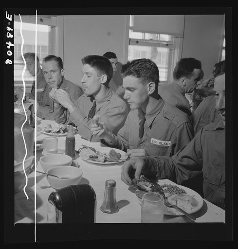Craig Field cadets made short work of chickens raised by FSA (Farm Security Administration) borrowers. Craig Field, Southeastern Air Training Center, Selma, Alabama