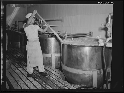 Untitled photo, possibly related to: Tomato juice is boiled in open vats and then piped to the canning room. Phillips Cannery, Cambridge, Maryland