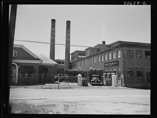 Untitled photo, possibly related to: Trucks come directly from field and unload tomatoes directly into the canning room. Phillips Packing Company, Cambridge, Maryland