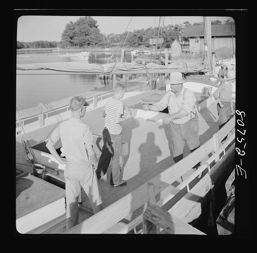 Untitled photo, possibly related to: It took six pair of hands to load this melon boat. Maryland