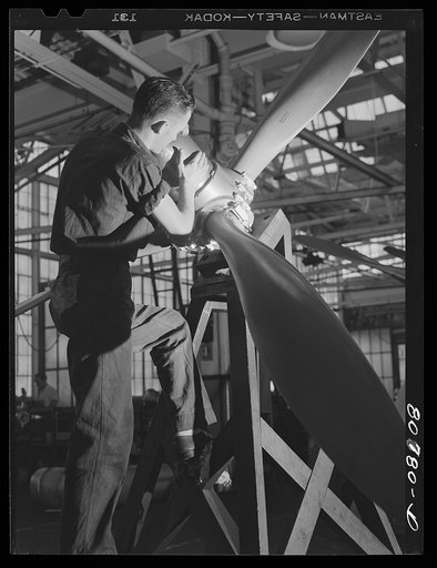 Adjusting hub on finished propeller. Hamilton propeller plant. East Hartford, Connecticut