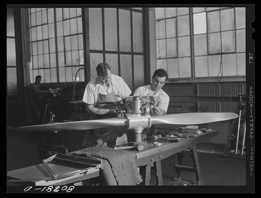 Adjusting assembled propeller. Hamilton propeller plant. East Hartford, Connecticut