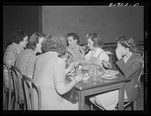 Women employees eating in the company cafeteria. Pratt and Whitney Corporation. East Hartford, Connecticut