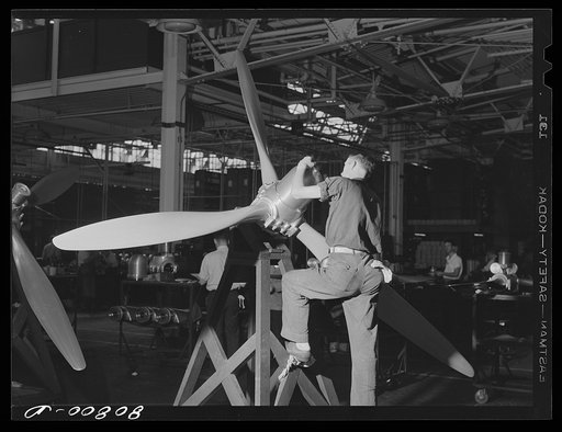 Adjusting hub on finished propeller at Hamilton propeller plant at East Hartford, Connecticut