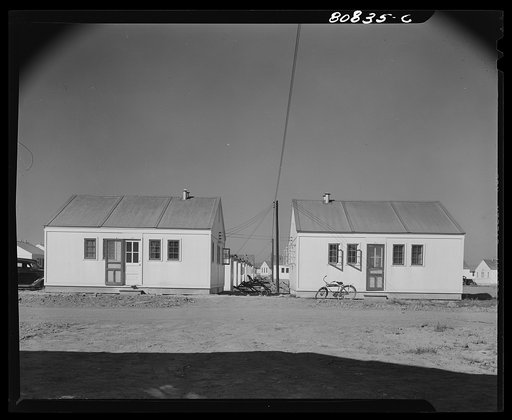 Prefabricated houses designed to accommodate two families. FSA (Farm Security Administration) defense housing project. Hartford, Connecticut