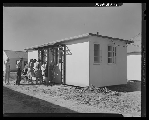 Neighbors making a call on new tenant just moved into FSA (Farm Security Administration) defense housing project. Hartford, Connecticut