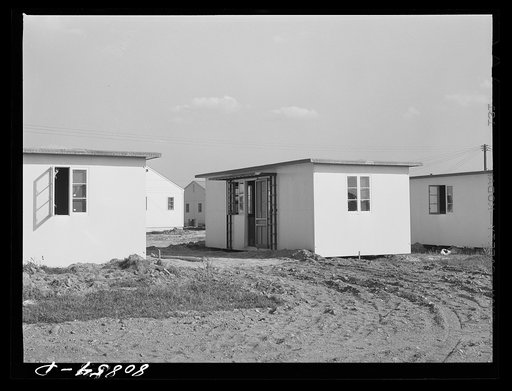 Houses designed to accomodate a single family. FSA (Farm Security Administration) defense housing project. Hartford, Connecticut