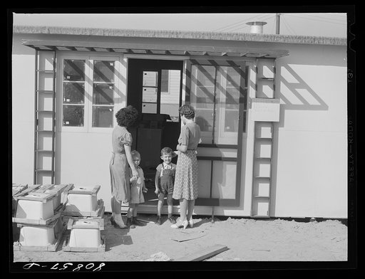 Prospective tenant inspecting "single family house" in the FSA (Farm Security Administration) defense housing project. Hartford, Connecticut