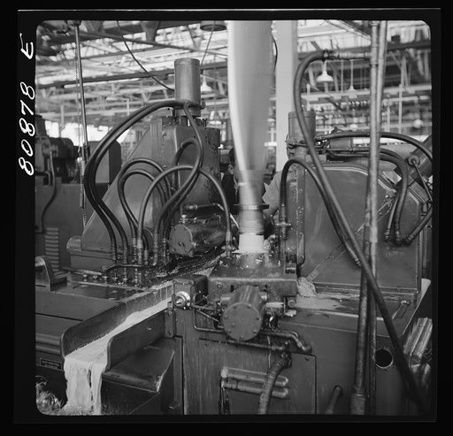 East Hartford, Connecticut. Blade reamer spinning out the base of a propeller at the Hamilton propeller plant