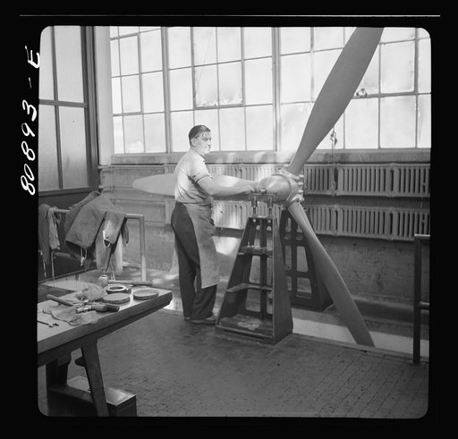 Untitled photo, possibly related to: Balancing propeller. Hamilton propeller plant, East Hartford, Connecticut