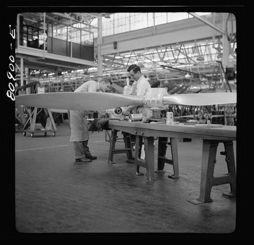 Assembling propeller blades to hub. Hamilton propeller plant, East Hartford, Connecticut