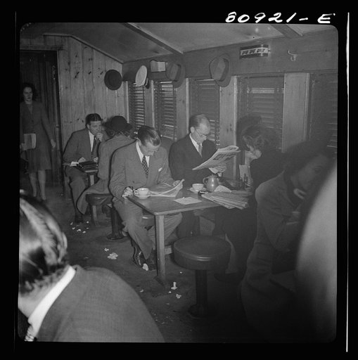 Untitled photo, possibly related to: Commuters on train to New York City