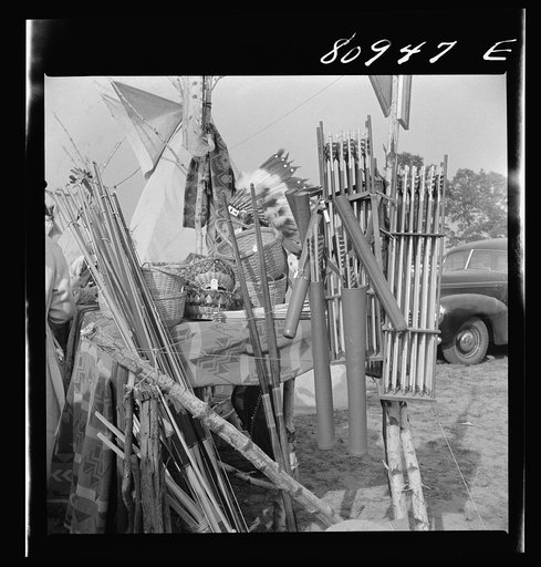 Machine-made arrows and sporting store bows were for sale at some of the stands. Local Indian association-sponsored Indian fair. Windsor Locks, Connecticut