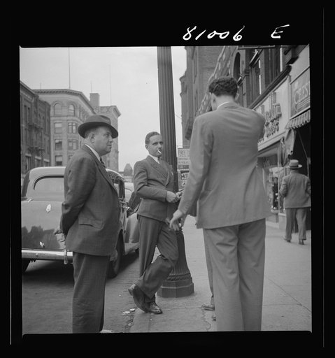 Men talk. Street scene at Holyoke, Massachusetts