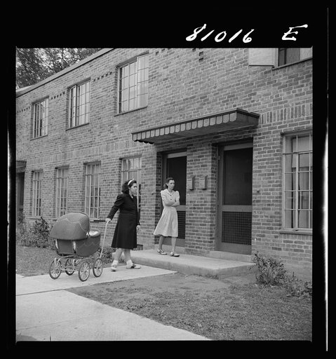 Holyoke, Massachusetts. Two women on one of the streets of the low income housing project of the FHA Federal Housing Administration)