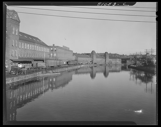 Untitled photo, possibly related to: Canals run in a half circle through the mill area at Holyoke, Massachusetts