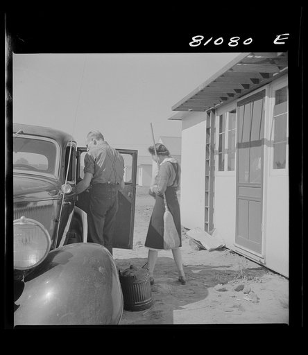 Untitled photo, possibly related to: Between shifts at the defense plant this FSA (Farm Security Administration) tenant moves into FSA defense housing project. Hartford, Connecticut