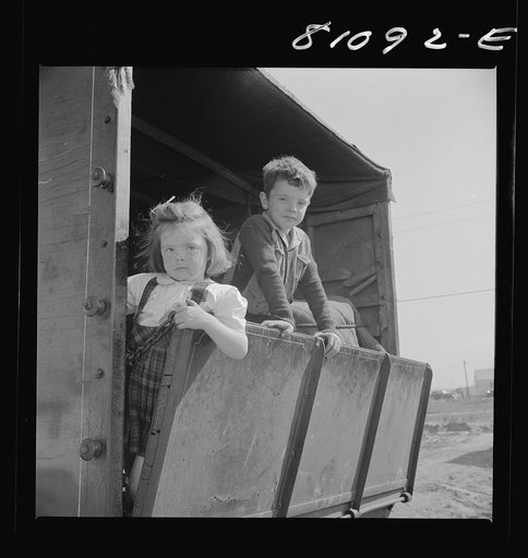 Children on a tomato picker's truck in Maryland