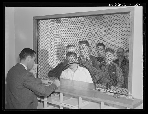 Untitled photo, possibly related to: Defense workers signing up for house. FSA (Farm Security Administration) defense housing project. Hartford, Connecticut