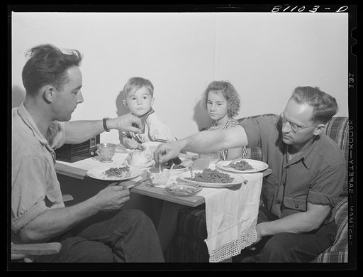 Untitled photo, possibly related to: This family is having its first meal in their new home. FSA (Farm Security Administration) defense housing project. Hartford, Connecticut