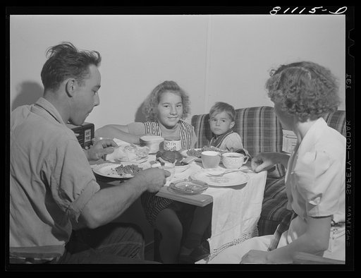 Untitled photo, possibly related to: This family is having its first meal in their new home. FSA (Farm Security Administration) defense housing project. Hartford, Connecticut