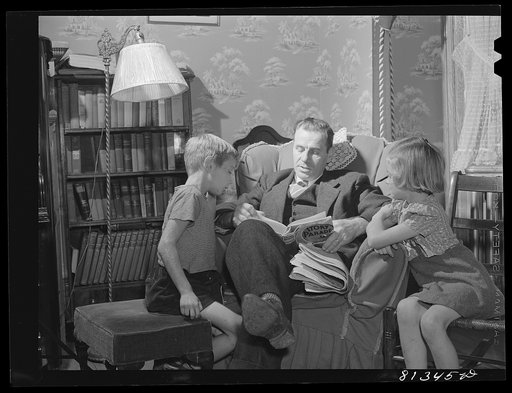 Williamstown, Massachusetts. Father reading to his children