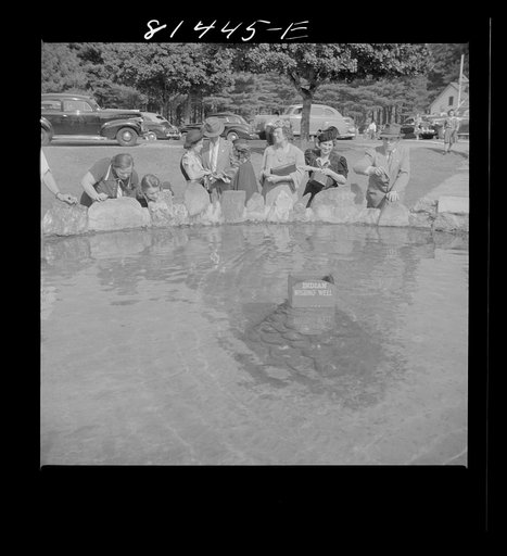 Untitled photo, possibly related to: Wishing well: throw your penny in the box and you get your wish. At Mohawk Trail, Massachusetts