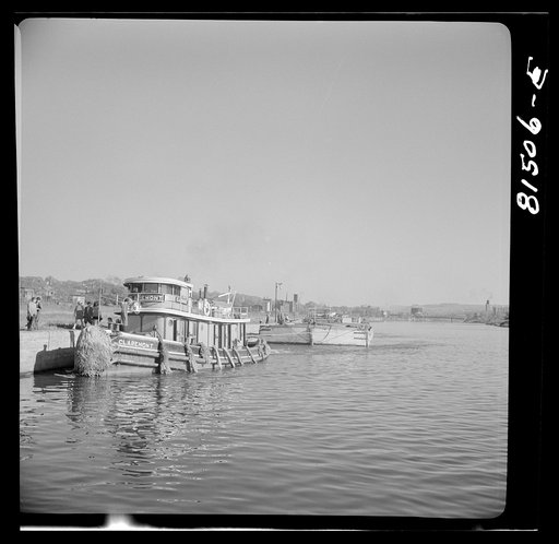 Barge under tow. Erie Canal, New York