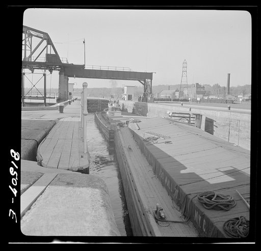 Untitled photo, possibly related to: Tug pulling barges through Lock Eleven. Erie Canal, New York