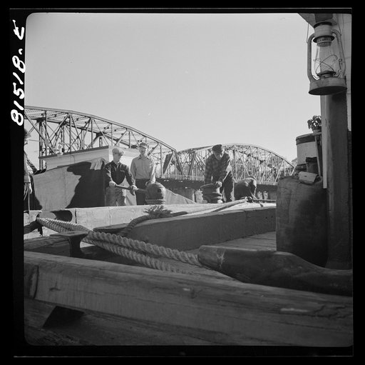 Barger being pulled through by winch, prior to picking up towline from tug. Erie Canal, New York