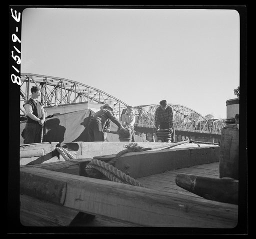Untitled photo, possibly related to: Barger being pulled through by winch, prior to picking up towline from tug. Erie Canal, New York