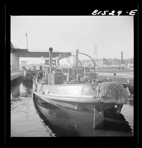 Untitled photo, possibly related to: Tug pulling barges through Lock Eleven. Erie Canal, New York