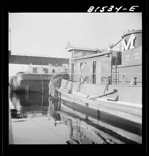 Untitled photo, possibly related to: Tug pulling barges through Lock Eleven. Erie Canal, New York