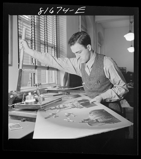 Washington, D.C. Preparing the defense bonds sales photomural, to be installed in the Grand Central terminal, New York, in the visual unit of the FSA (Farm Security Administration). Milton Tinsley mounting parts of the dummy
