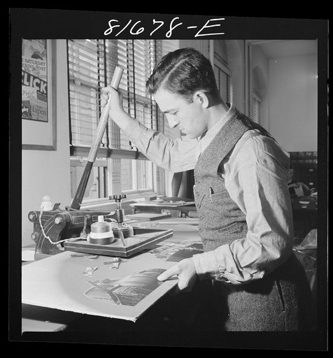 Untitled photo, possibly related to: Washington, D.C. Preparing the defense bonds sales photomural, to be installed in the Grand Central terminal, New York, in the visual unit of the FSA (Farm Security Administration). Milton Tinsley mounting parts of the dummy