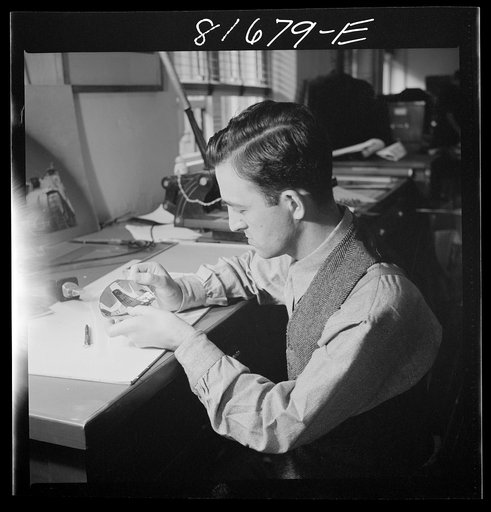 Untitled photo, possibly related to: Washington, D.C. Tinsley preparing the defense bonds sales photomural for Grand Central terminal, New York