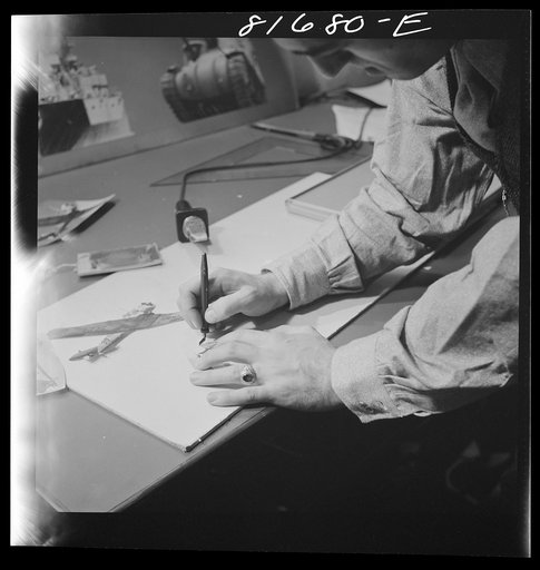 Untitled photo, possibly related to: Washington, D.C. Preparing the defense bond sales photomural, to be installed in the Grand Central terminal, New York, in the visual unit of the FSA (Farm Security Administration). Milton Tinsley mounting part of the dummy