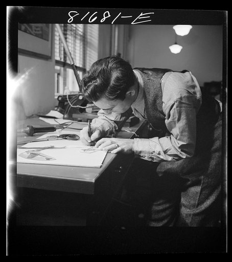 Untitled photo, possibly related to: Washington, D.C. Preparing the defense bond sales photomural, to be installed in the Grand Central terminal, New York, in the visual unit of the FSA (Farm Security Administration). Milton Tinsley mounting part of the dummy