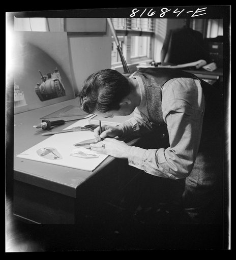 Untitled photo, possibly related to: Washington, D.C. Preparing the defense bond sales photomural, to be installed in the Grand Central terminal, New York, in the visual unit of the FSA (Farm Security Administration). Milton Tinsley mounting part of the dummy