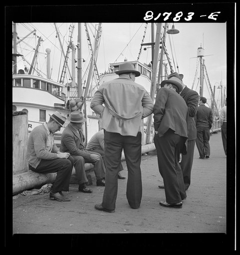 Italian fishermen gathered on "Fisherman's Wharf." San Francisco, California