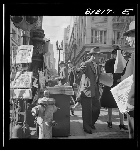 Corner of Montgomery and Market Streets, Monday morning, after Japanese attack on Pearl Harbor. San Francisco, California