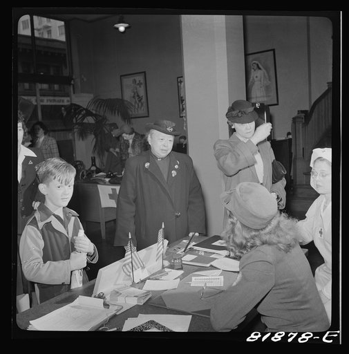 Signing up for Red Cross duties. Red Cross headquarters. San Francisco, California