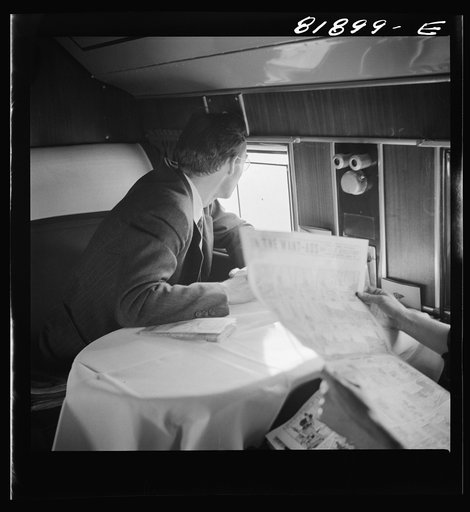 Untitled photo, possibly related to: Passengers aboard an American airliner